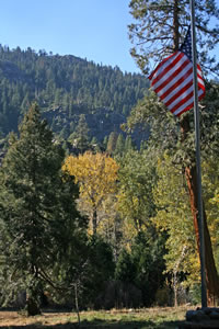 The American Flag flies high above Kennedy Meadows Resort